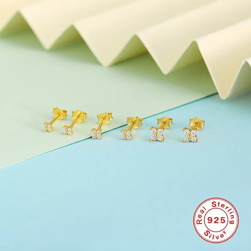 S925 sterling silver stud earrings with a geometric crystal flower design in gold or platinum plating.