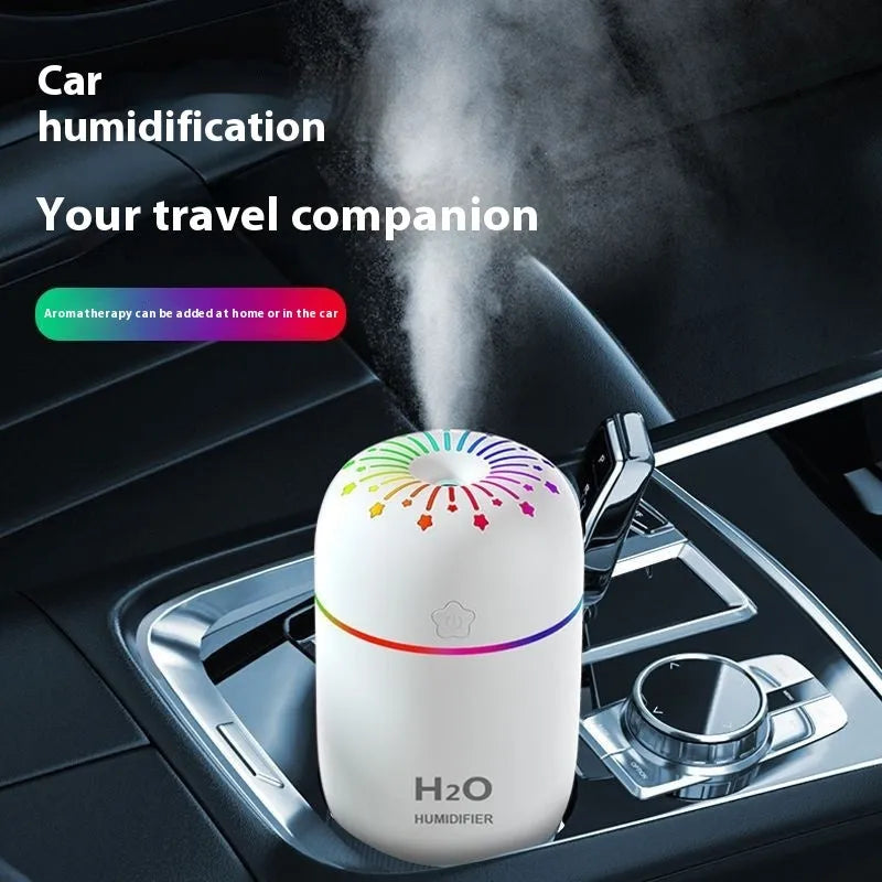 USB mini humidifier with fireworks design in green colour, showing compact 75x75x116mm dimensions