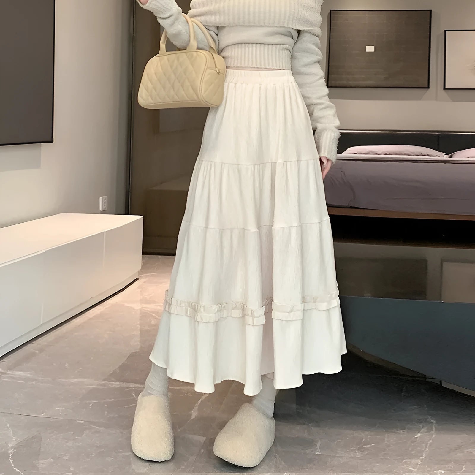 Korean style A-line corduroy skirt with elastic waistband in beige colour showing midi length