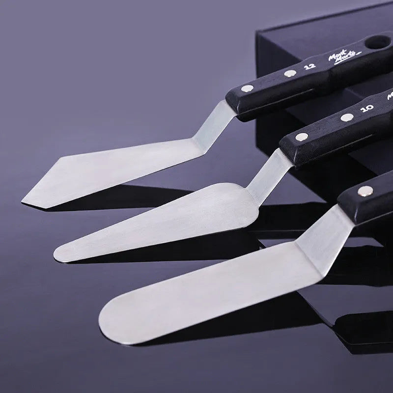 Three stainless steel palette knives for oil and acrylic painting, styles No. 3, No. 10, and No. 12.