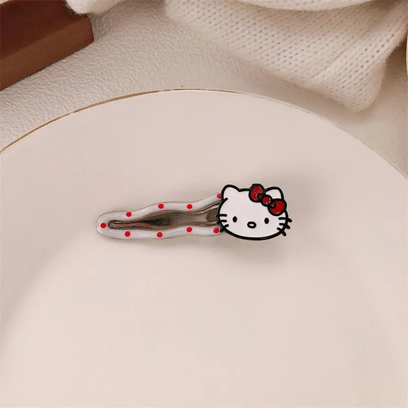 Red love heart-shaped plastic hair clip with retro dots and a willow leaf silhouette on a white background.