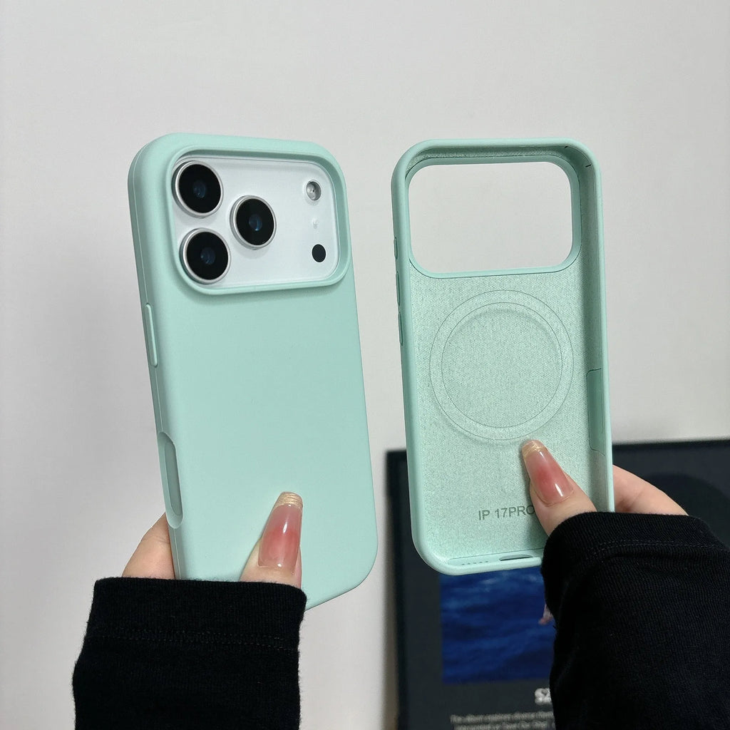 Liquid silicone magnetic iPhone case with Ai button in antique white colour on a table.