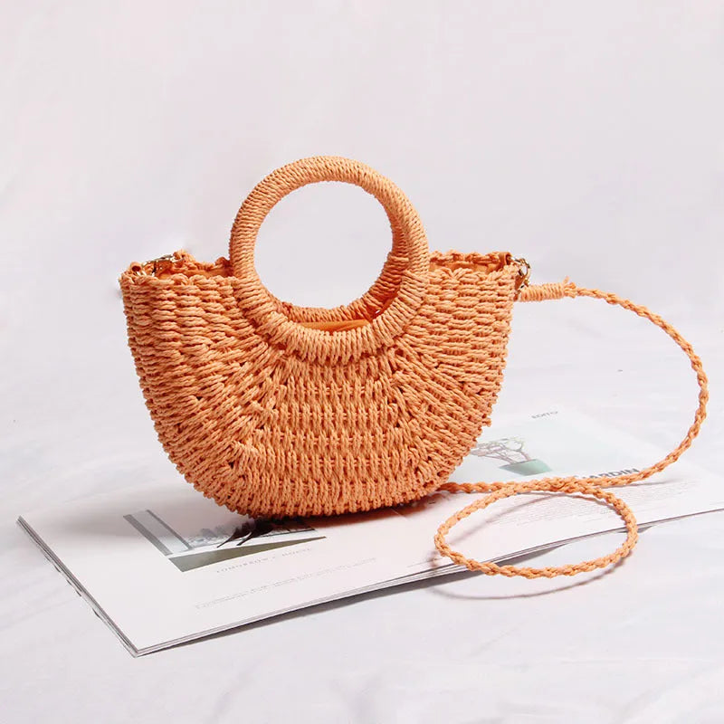 Seaside Vacation Beach Mini Straw Bag in dumpling shape with woven texture and open pocket, available in multiple colours
