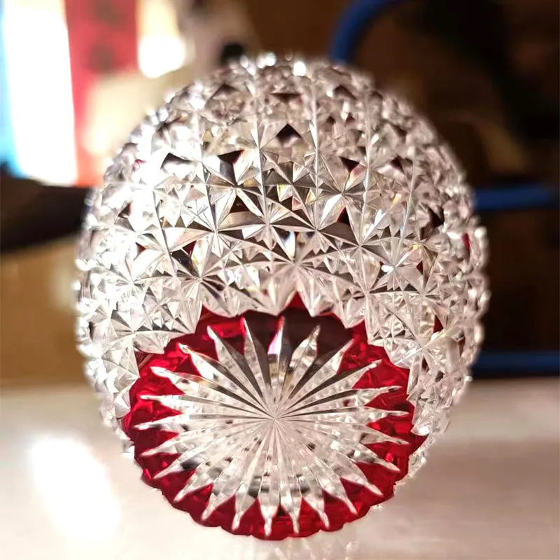 Japanese-style hand carved red crystal glass cup with cylindrical shape and carved pattern
