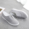 Low-top canvas casual shoes with flat heel and breathable cloth lining in multiple colour options