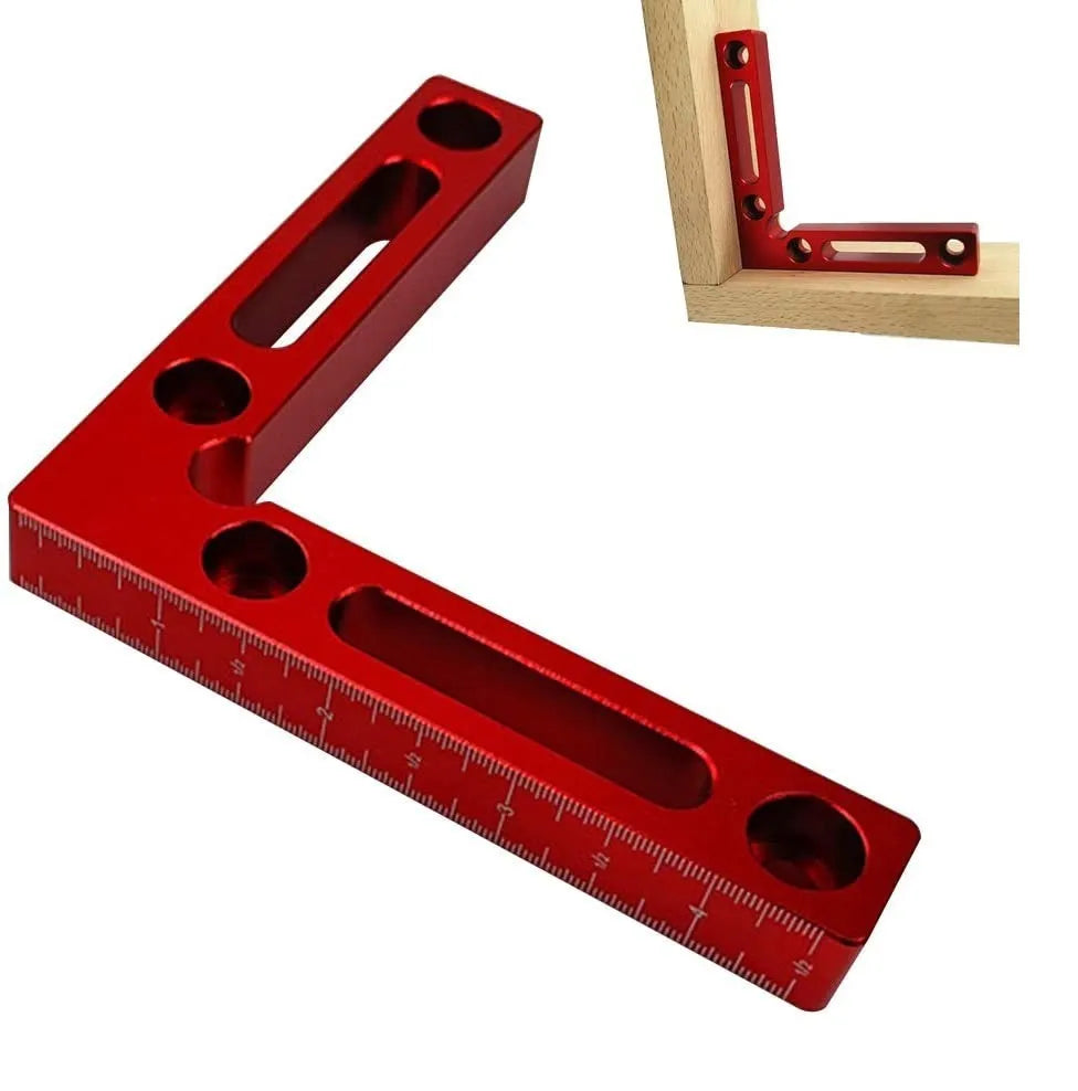 Aluminium alloy right angle positioning block for woodworking jigsaws with measurement scale.