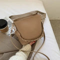 Retro woven PU leather bucket bag in khaki colour with crossbody strap.
