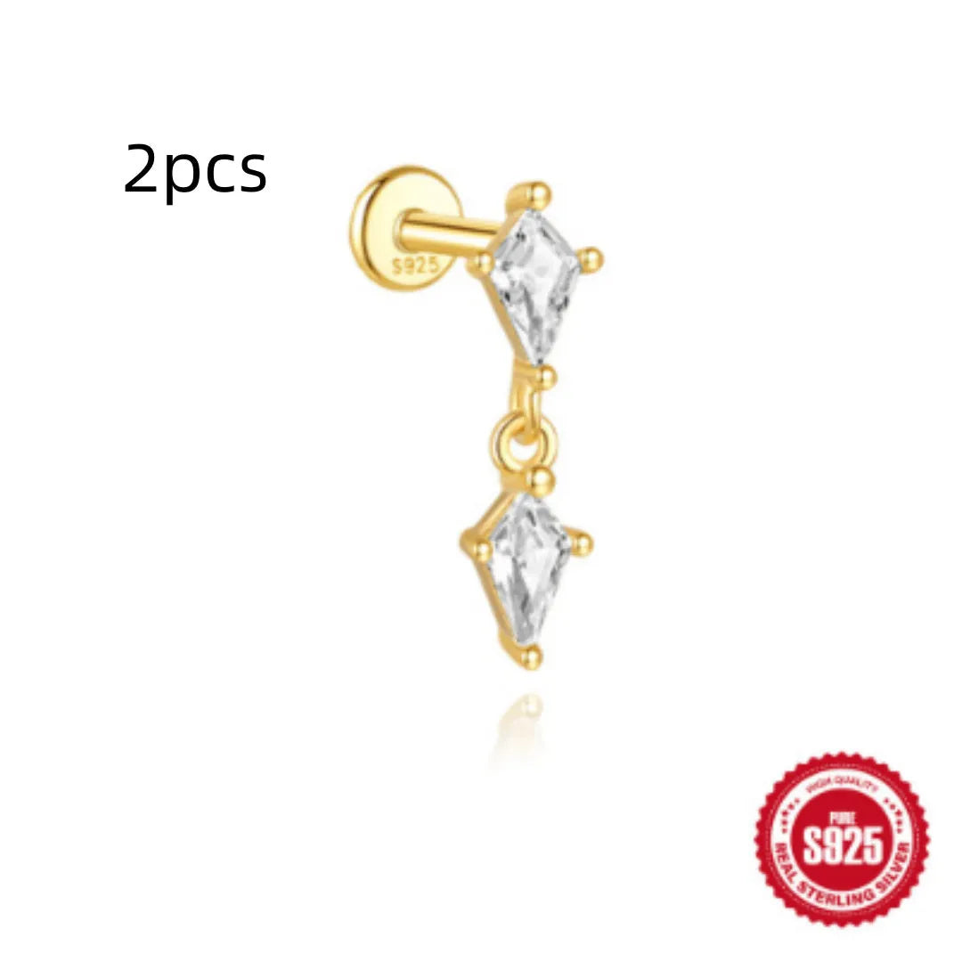 S925 sterling silver water drop shaped earrings with a flat spiral geometric design on a white background.