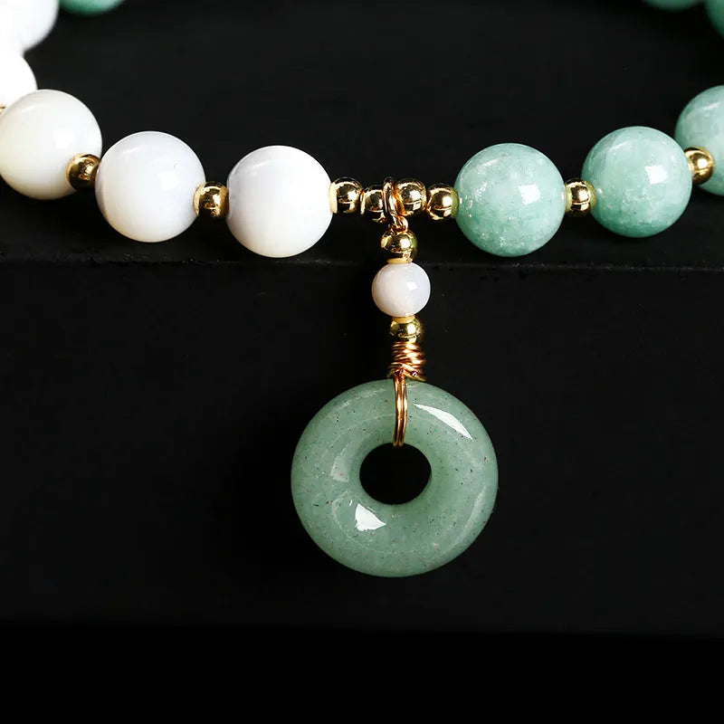 Women's blue Burma jade bracelet with geometric design and horseshoe screw safety buckle