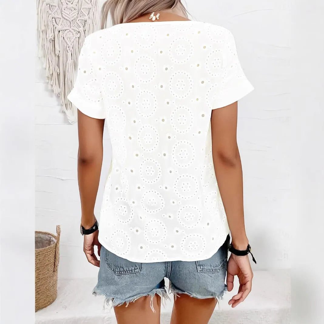 White women's V-neck T-shirt with hollow-out design detail and short sleeves.