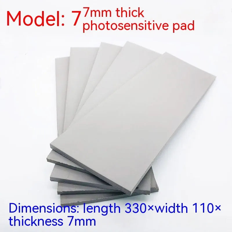 Black and grey plastic light-sensitive craft mat for seal making, showing 7mm, 4mm and 2mm thickness options.
