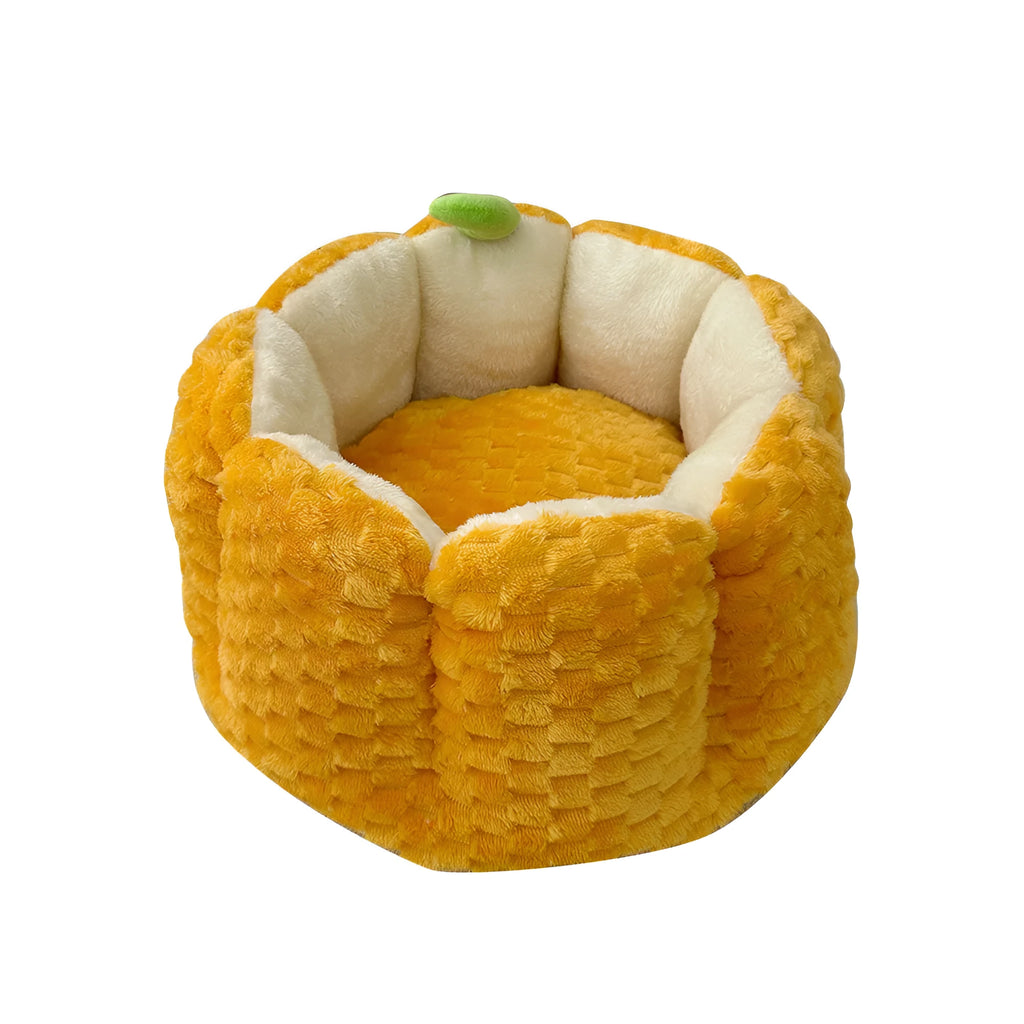 Orange pumpkin-shaped pet nest bed for cat or small dog with cotton filling.