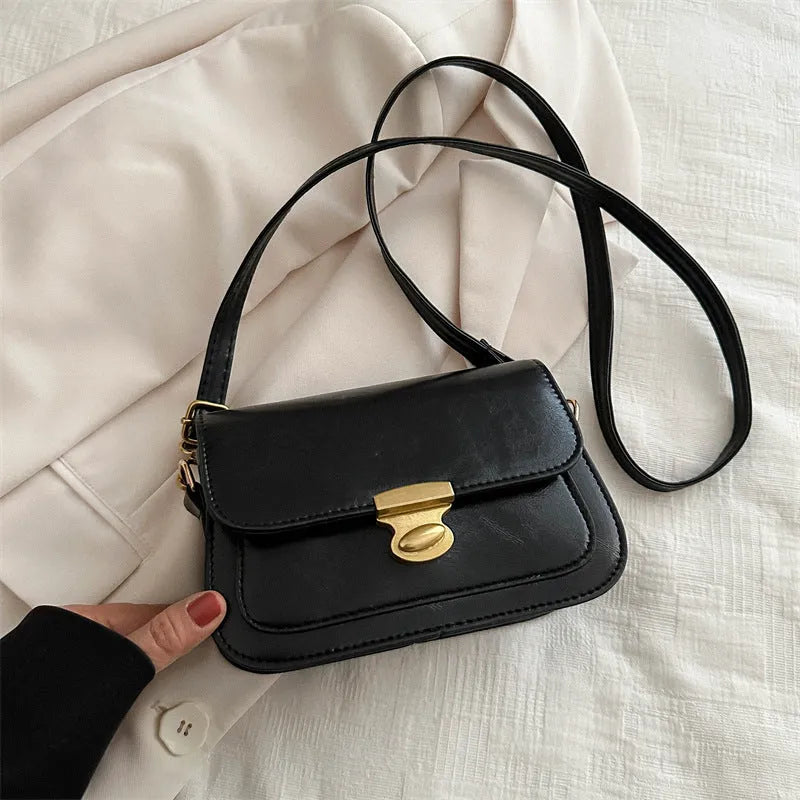 Small horizontal square handbag in soft PU leather, shown in black, brown, dark brown, and light brown.