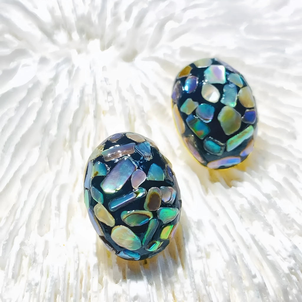 Lacquer rhinoceros skin bead and pearl stud earrings with Chinese character 'Fu' motif in geometric abstract shape, mother-of-pearl colour
