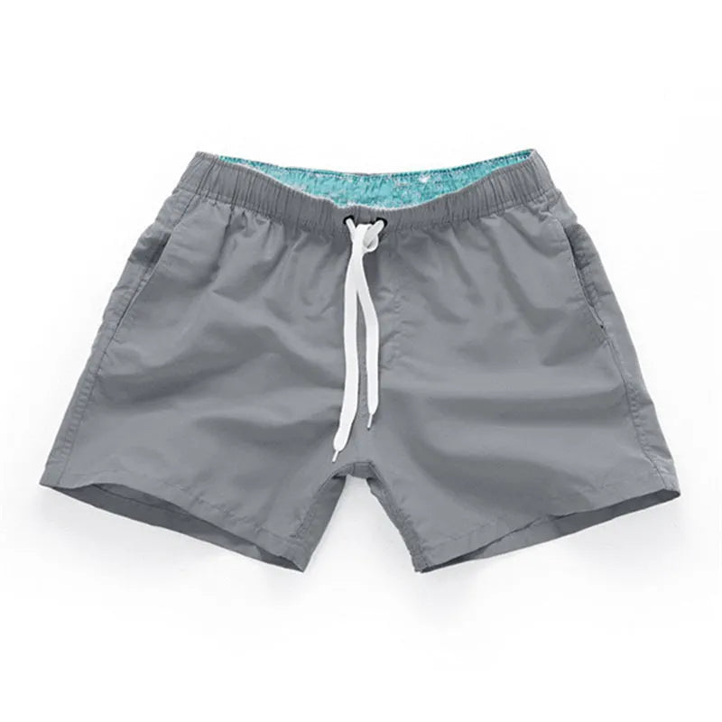 Men's plus size beach shorts in multiple colours including dark grey and navy blue with straight leg design for swimming and surfing