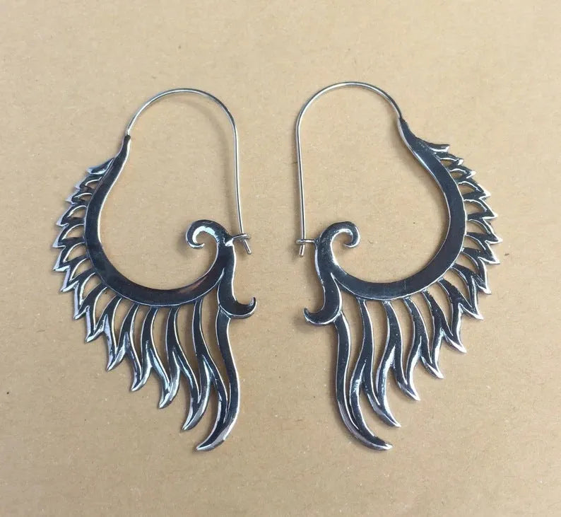 Silver retro creative women's earrings made from electroplated alloy in fashion OL style