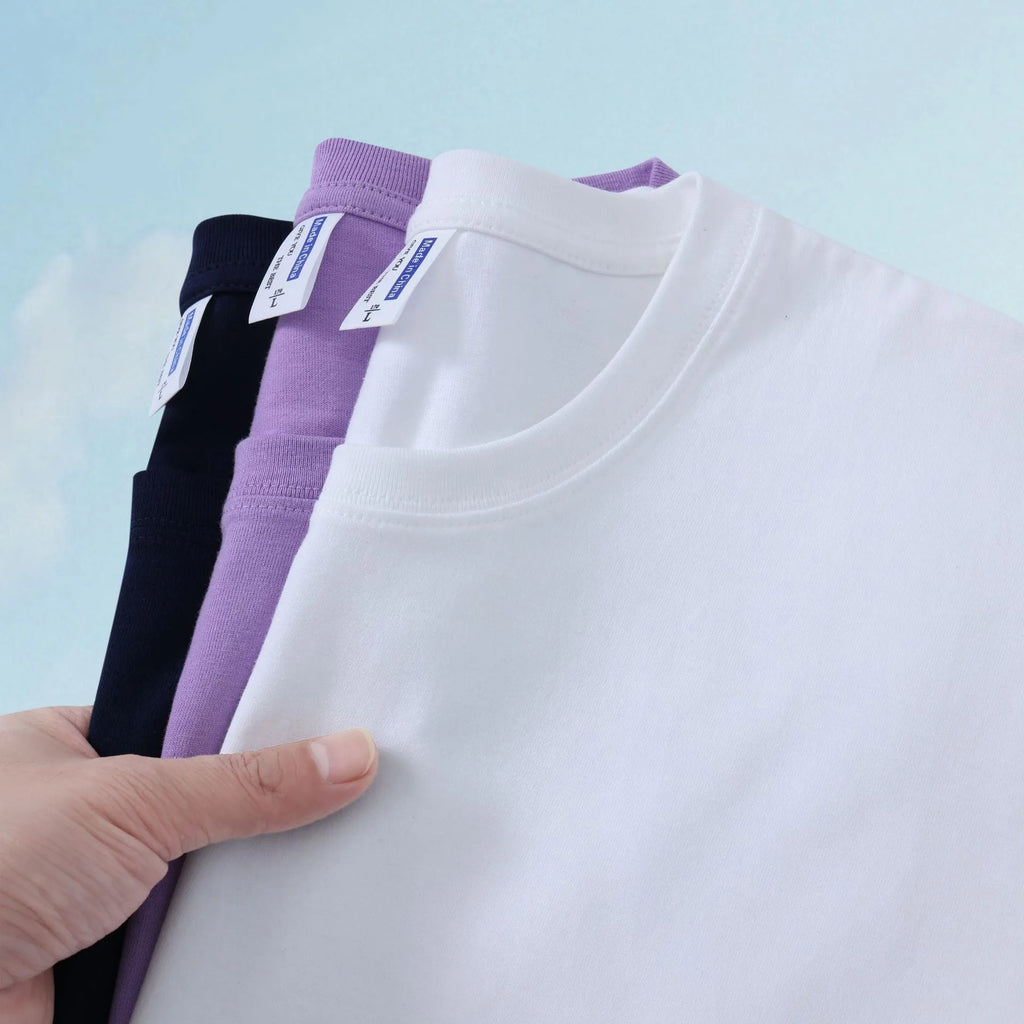 Loose fit cotton t-shirt in multiple solid colours including navy blue, red and white