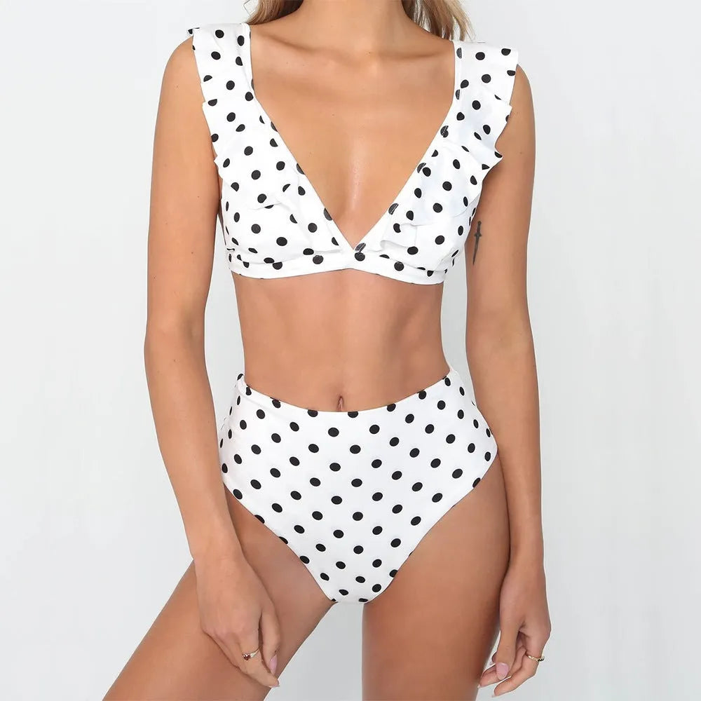 Black and white polka dot print bikini set with deep V-neck top and ruffled design