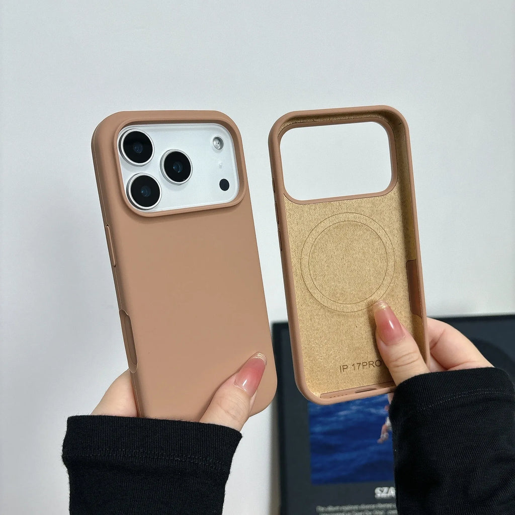 Liquid silicone magnetic iPhone case with Ai button in antique white colour on a table.