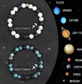 Set of two natural stone beaded bracelets with zodiac sign designs.