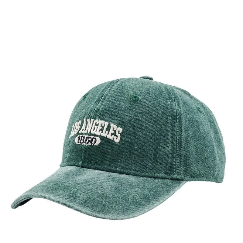 Retro personalised peaked cap with letters embroidery in beige, adjustable strap visible.