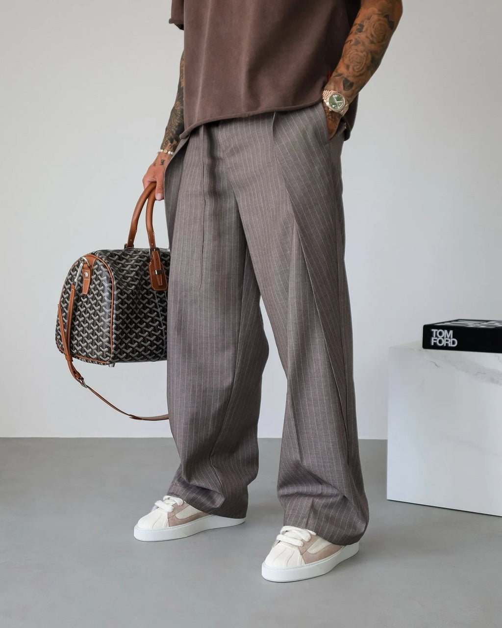 Men's casual striped lace-up polyester trousers in regular fit, front view.