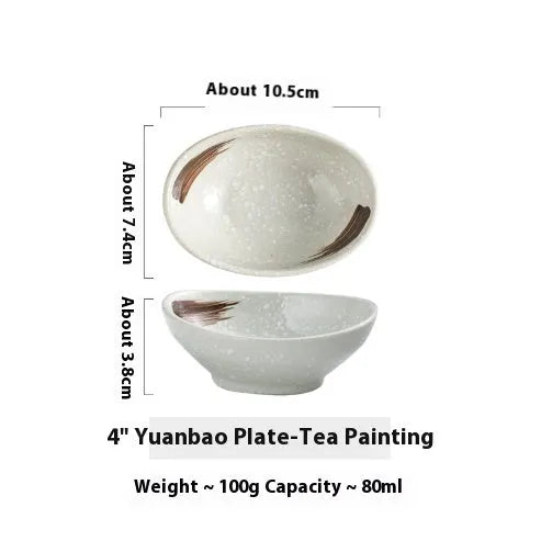 Oval-shaped Japanese ceramic sauce dipping bowl with an underglaze decorative pattern.