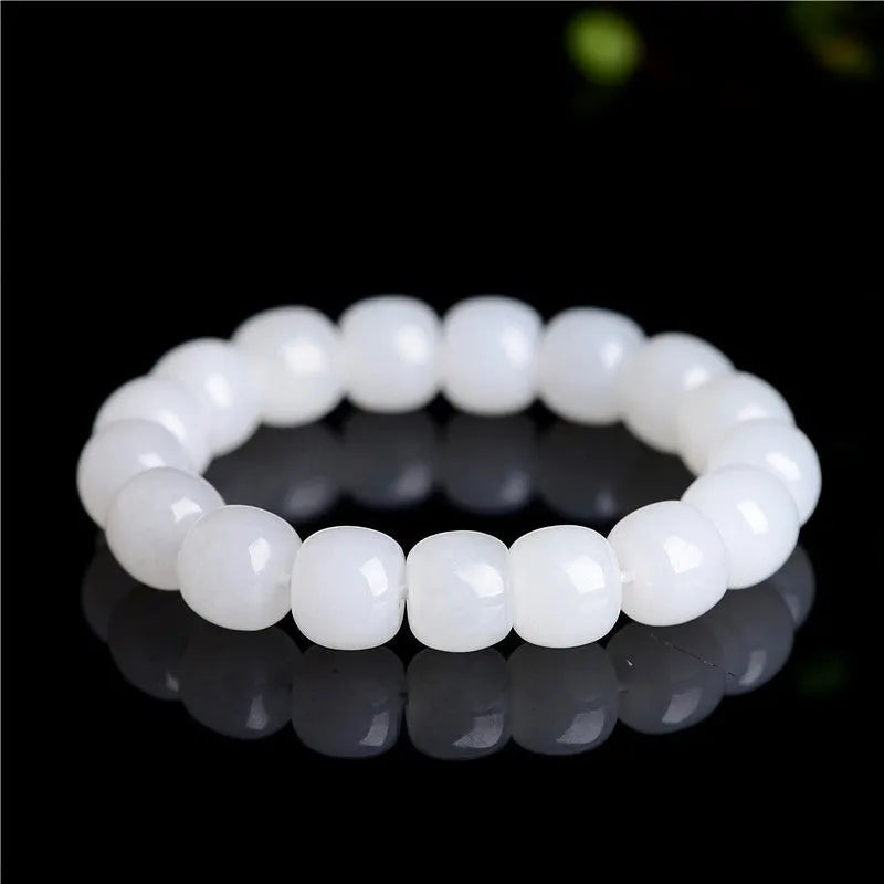 White jade barrel beads bracelet on wrist, Hetian jade, unisex casual style