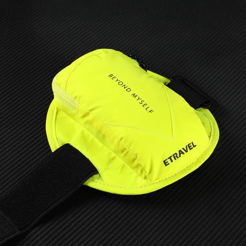 Reflective fluorescent yellow running arm bag with adjustable strap for outdoor sports.