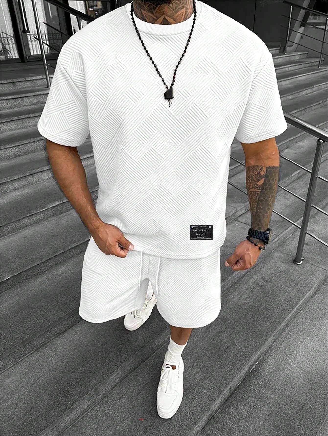 Men's two-piece shorts set with 3D printed design in chemical blend fabric