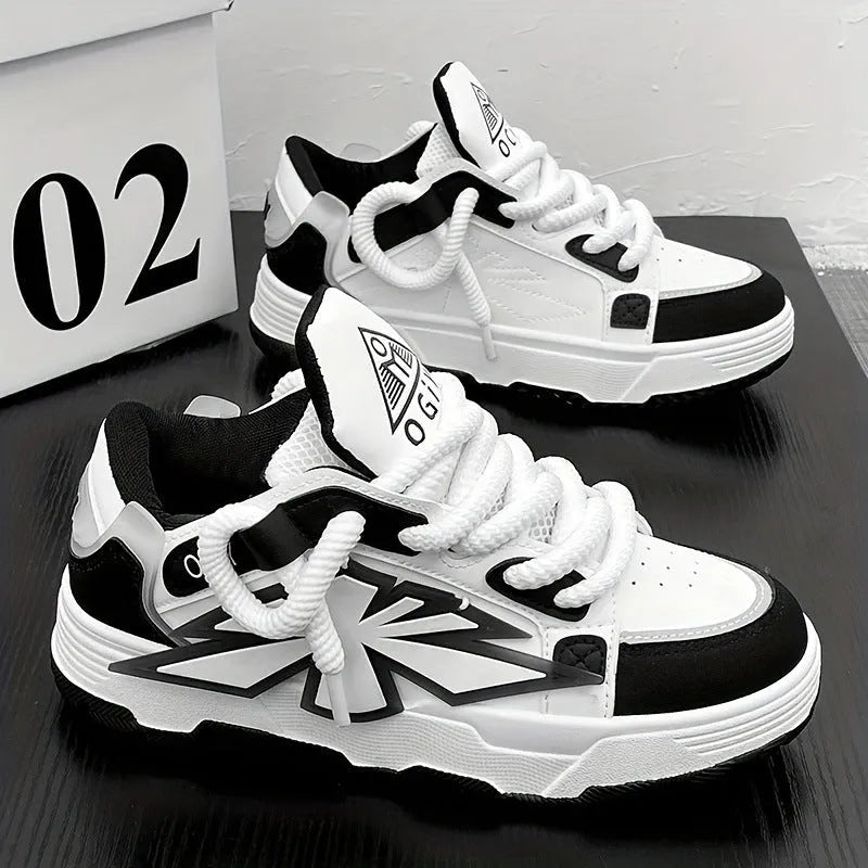 Men's white clunky casual sneakers with cartoon totem pattern, round toe, and lace-up front on a rubber sole.