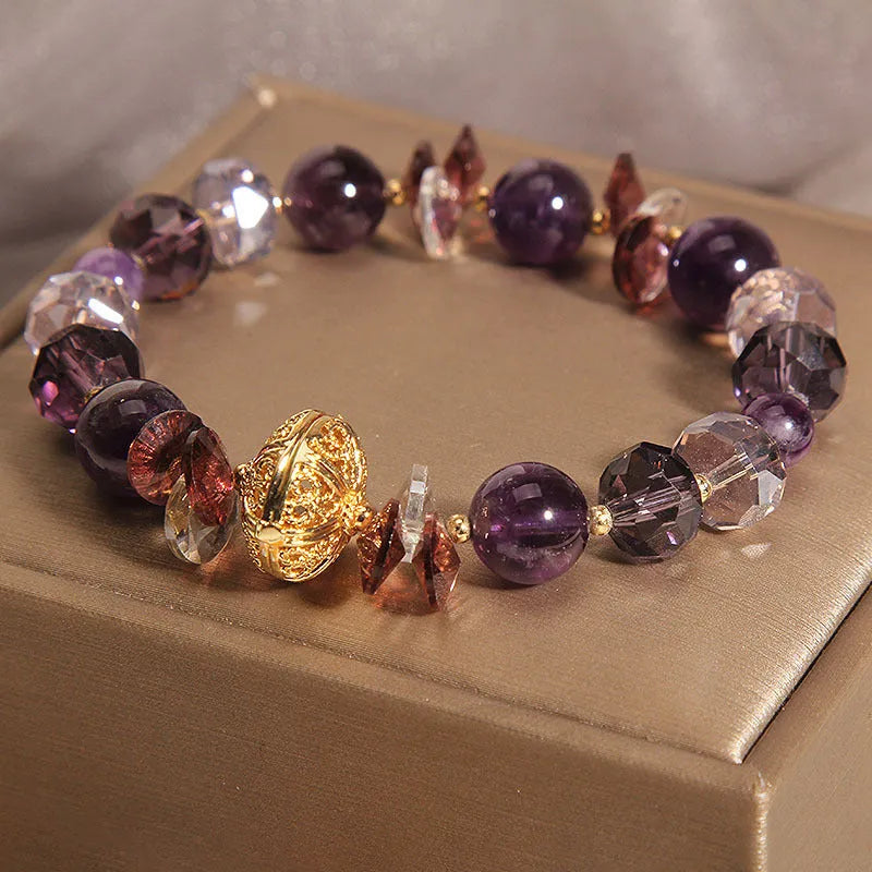 Purple crystal women's bracelet with pumpkin, wind chime, and lucky bead design featuring rhinestone details