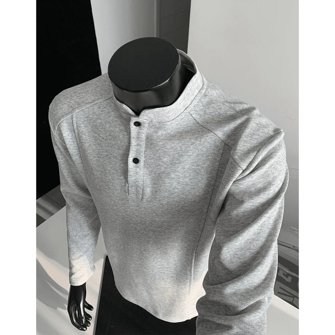 Men's patchwork stand-up collar sweater in black with asymmetric shoulder and long sleeves, loose fit