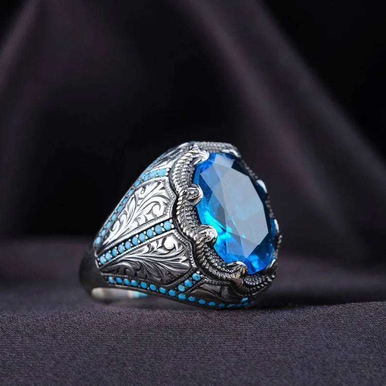 Geometric antique silver alloy ring with blue zircon stone showing European American styling