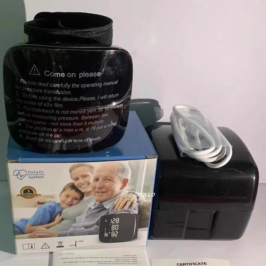 Black wrist blood pressure monitor with USB charging cable and multilingual voice function.