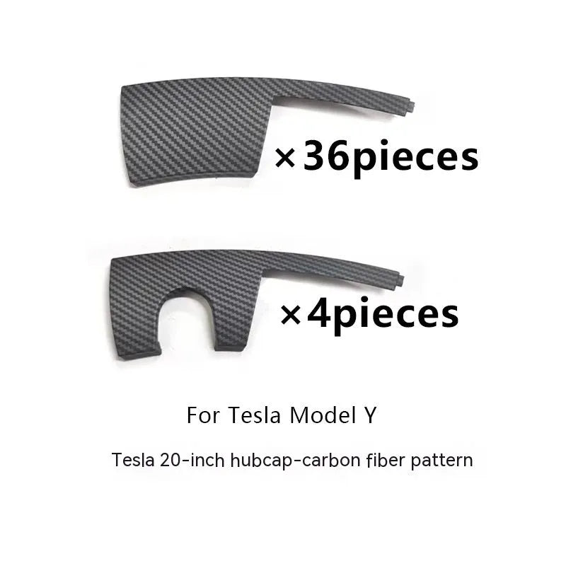 Tesla Model Y wheel hub cover with sectional steel ring design in black finish.