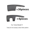 Tesla Model Y wheel hub cover with sectional steel ring design in black finish.