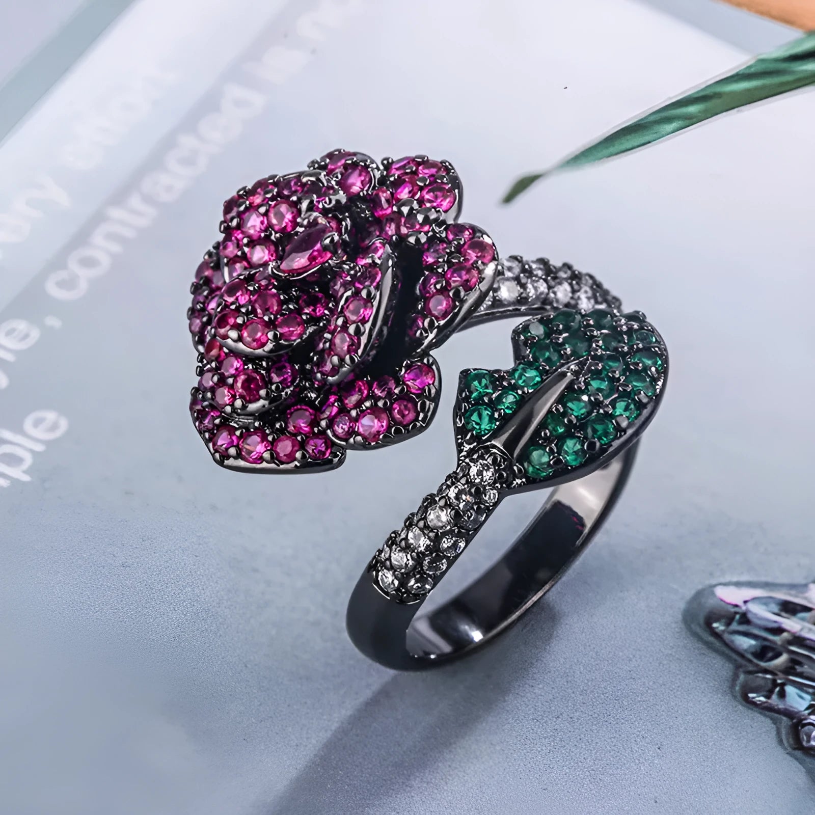 Gold-plated black gold geometric flower ring with simulation red corundum stones