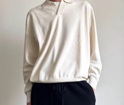 Man's milky white pure wool polo neck sweater with lapel collar and long sleeves.