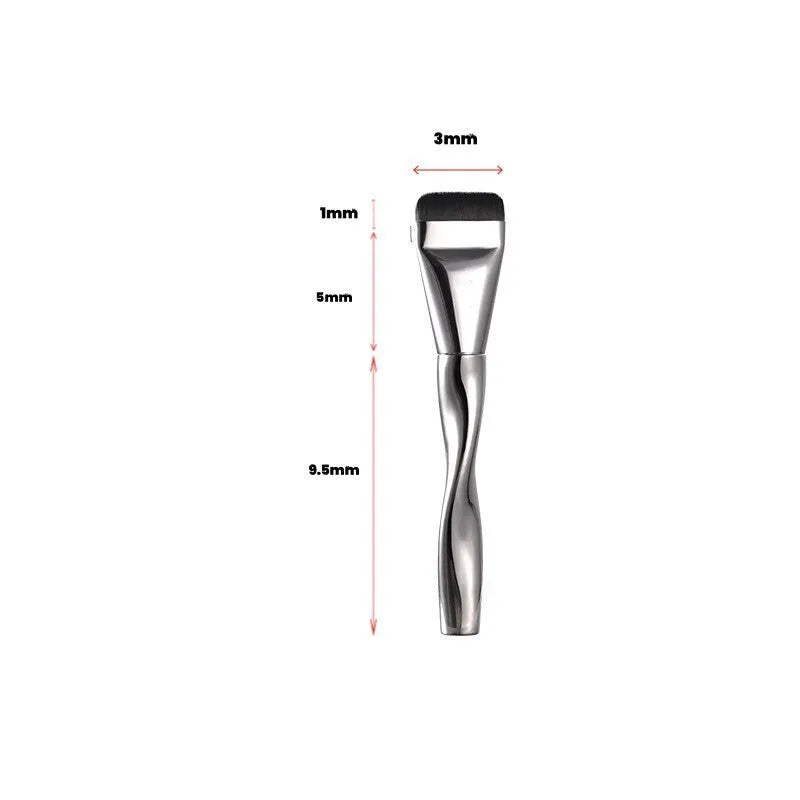 Spiral one-shaped black powder foundation brush with long handle and puff on pineapple box.