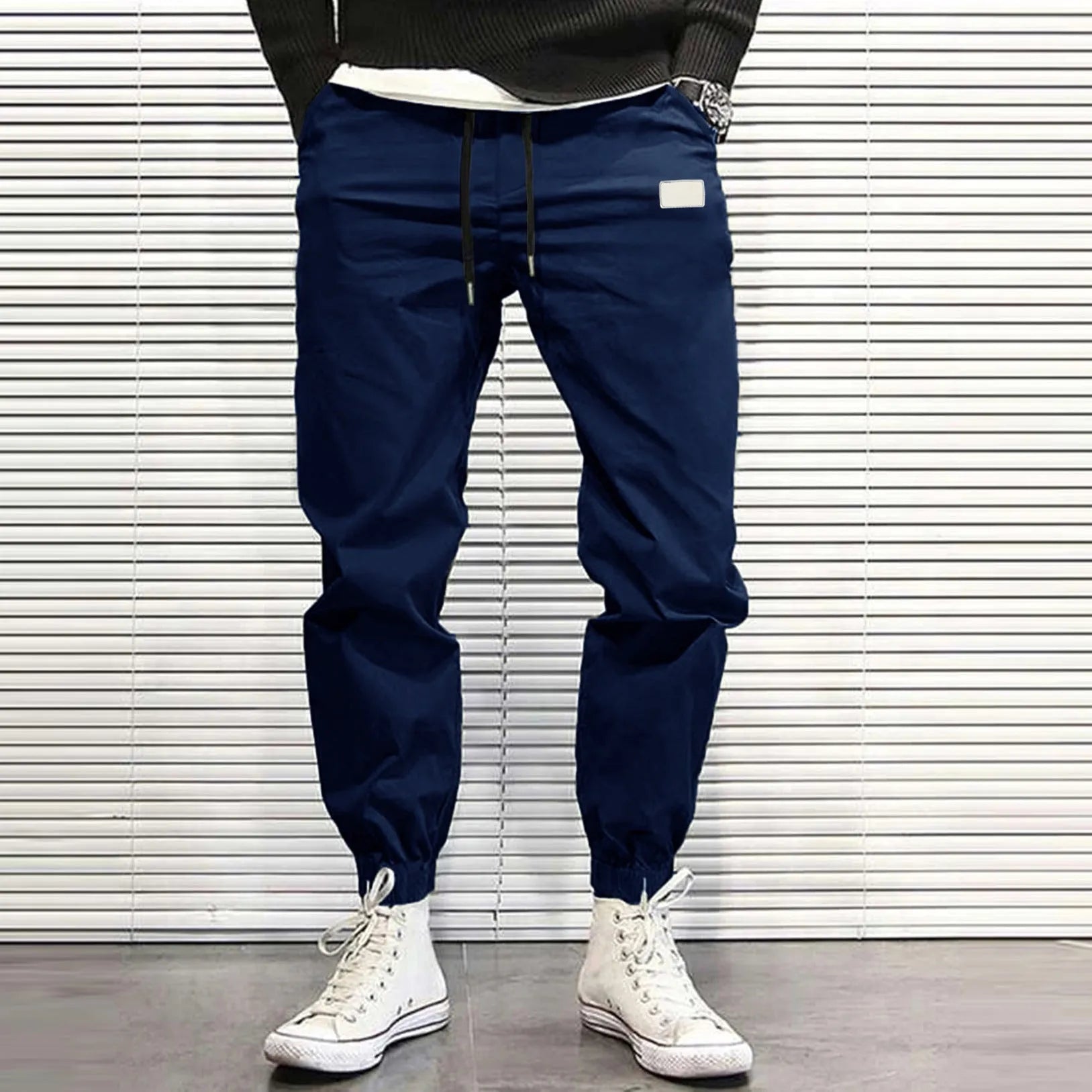 Loose fit quick-dry running trousers in polyester nylon blend, available in four colours and sizes M to XXXL