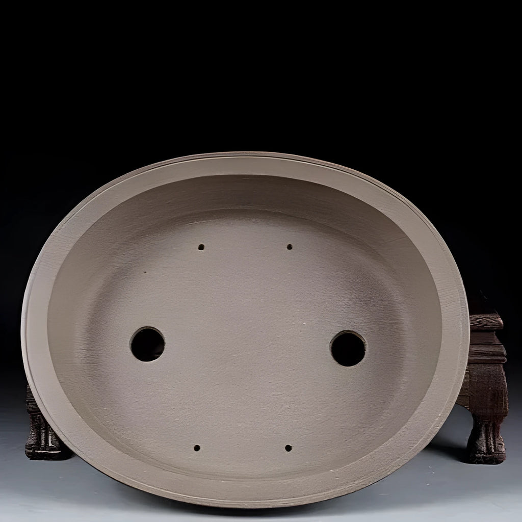 Handmade purple sand ceramic oval bonsai pot measuring 25cm by 21cm