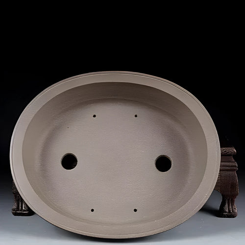 Handmade purple sand ceramic oval bonsai pot measuring 25cm by 21cm