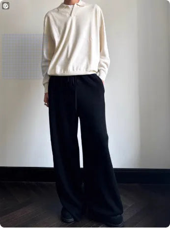 Man's milky white pure wool polo neck sweater with lapel collar and long sleeves.