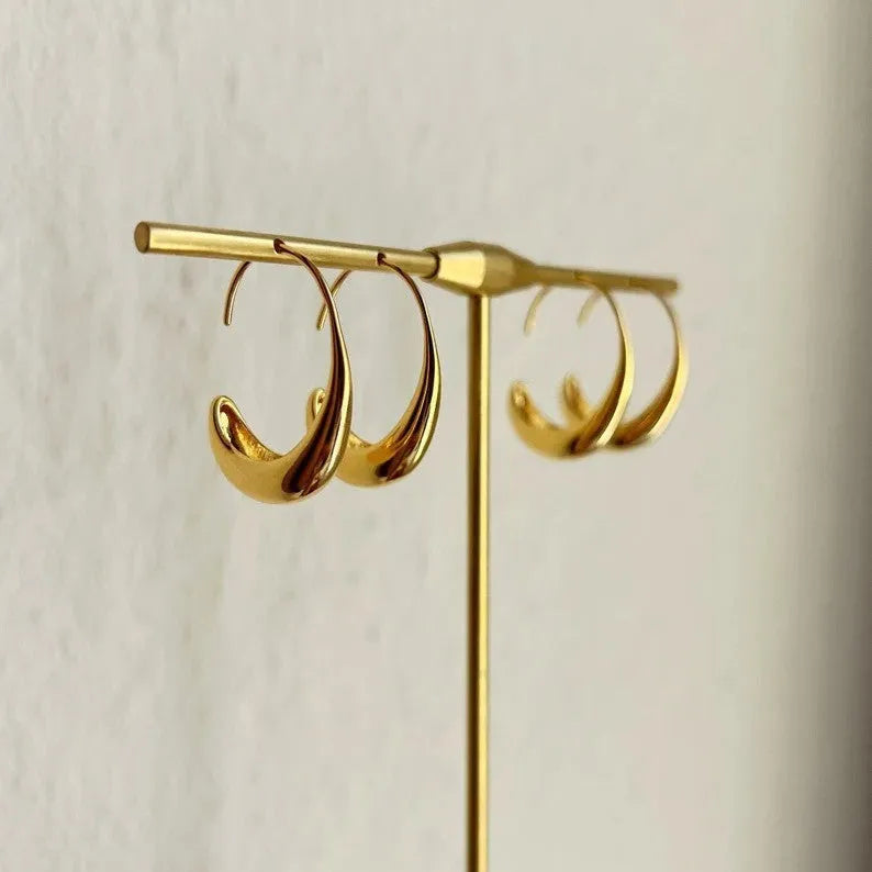 Gold and silver snake design alloy earrings with electroplated finish