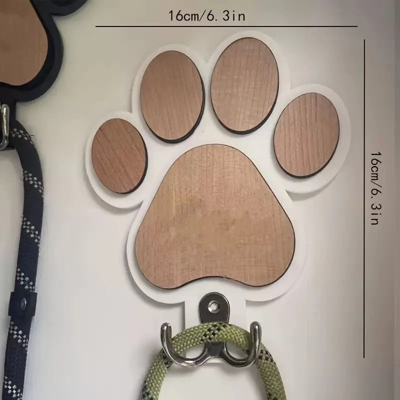 Black and white wooden paw print silhouette wall hook with 3-5kg load capacity for coats and keys