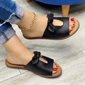 Ladies fish mouth sandals with a bow decoration in black, pink, or gold colours