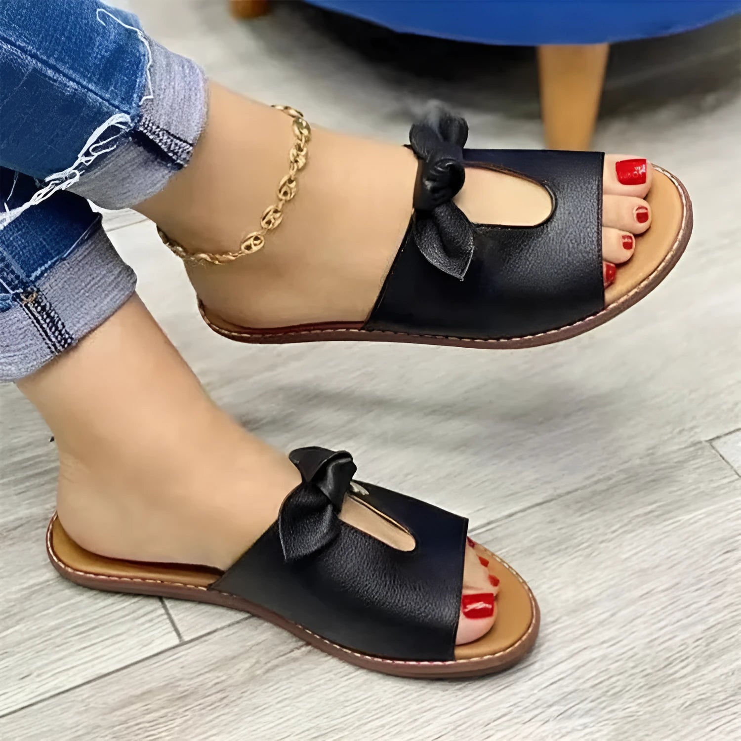 Ladies fish mouth sandals with a bow decoration in black, pink, or gold colours