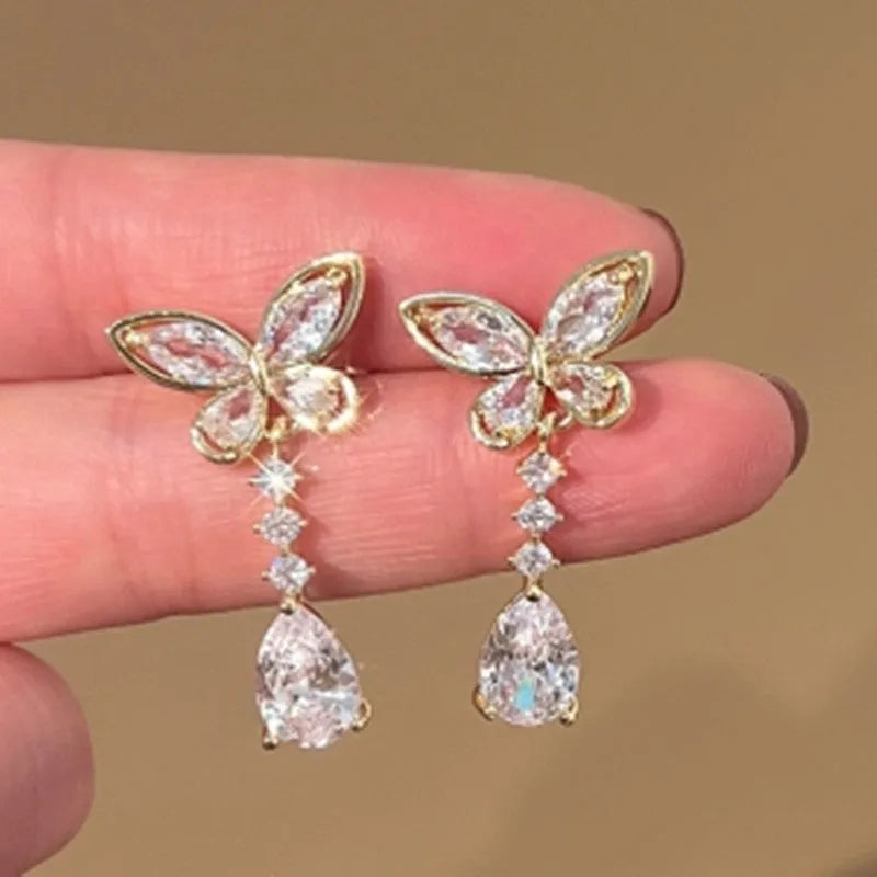 Platinum colour bow stud earrings with electroplated zinc alloy construction