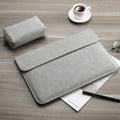 Frosted abrasive computer bag sleeve in grey for 13 inch MacBook Pro with textured surface